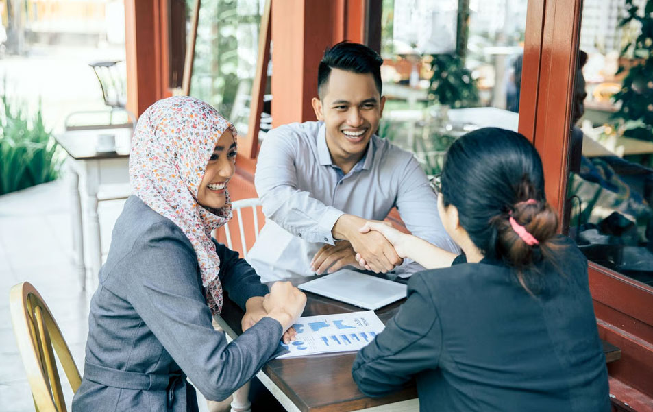 Professional notary and legal team collaborating in modern office environment
